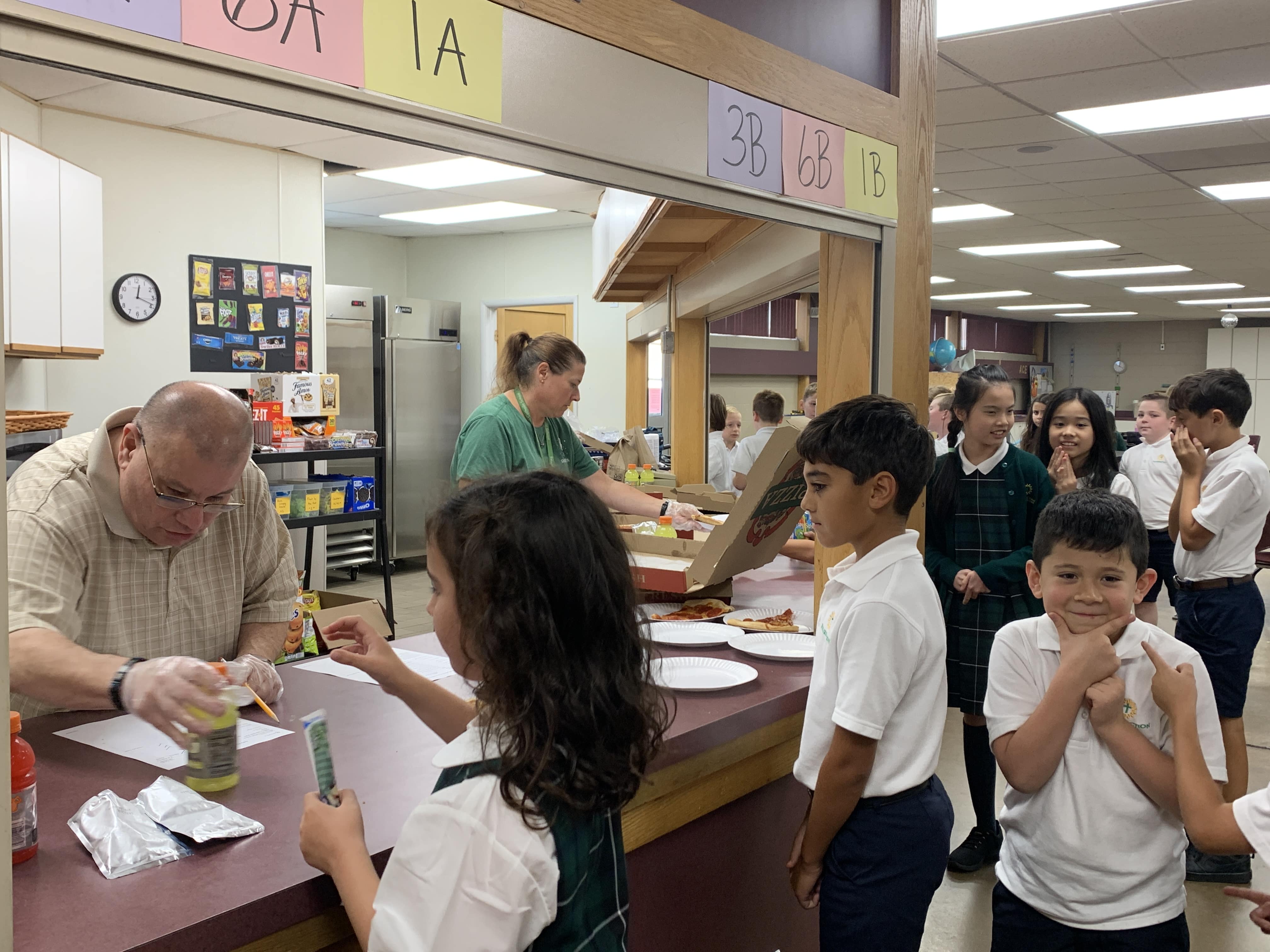 Volunteers serving students